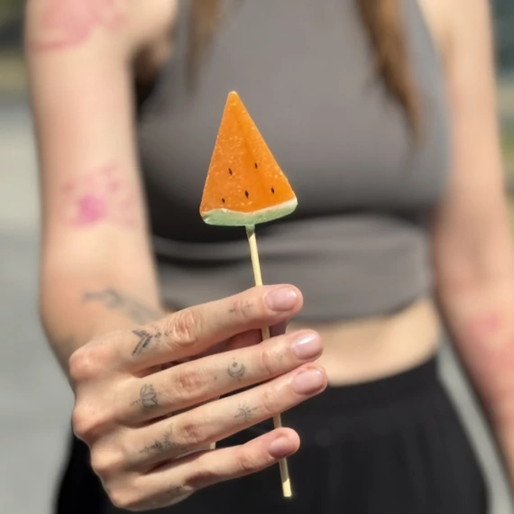 DINNYE nyalóka 16g Narancssárga